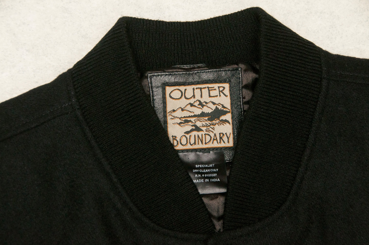 Y2K Outer Boundary x Kwal Paint varsitytakki (XXL)